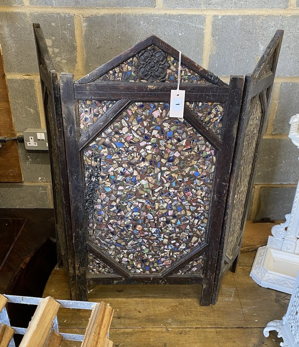 A carved oak and mosaic three-fold firescreen, height 86cm